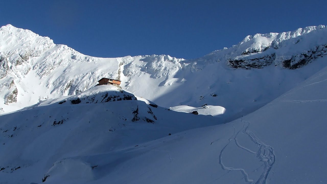 Snow-covered valley of Balea and the Transfagarasan in winter - The descent